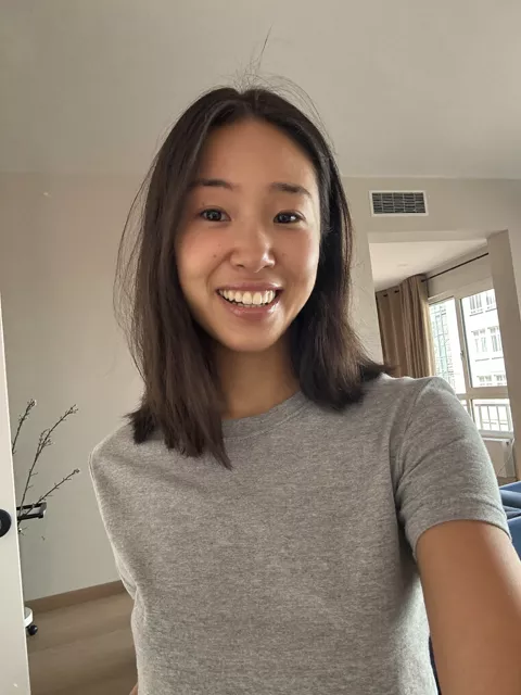 An ordinary indoor phone selfie used as a source photo